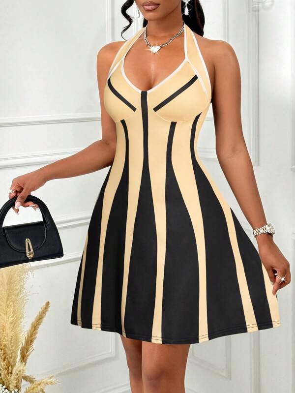 Amarilo Women's Summer Black And White Color Block Halter Neck Mini A Hem Dress (Positioning Printing)