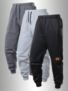 Men's Four-Season Sporty Jogging Pants, With Adjustable Drawstrings, Side Pockets And Patch Logo Design, Suitable For Wearing At The Gym, Running, Training And Casual Occasions.