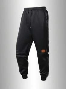 Men's Four-Season Sporty Jogging Pants, With Adjustable Drawstrings, Side Pockets And Patch Logo Design, Suitable For Wearing At The Gym, Running, Training And Casual Occasions.