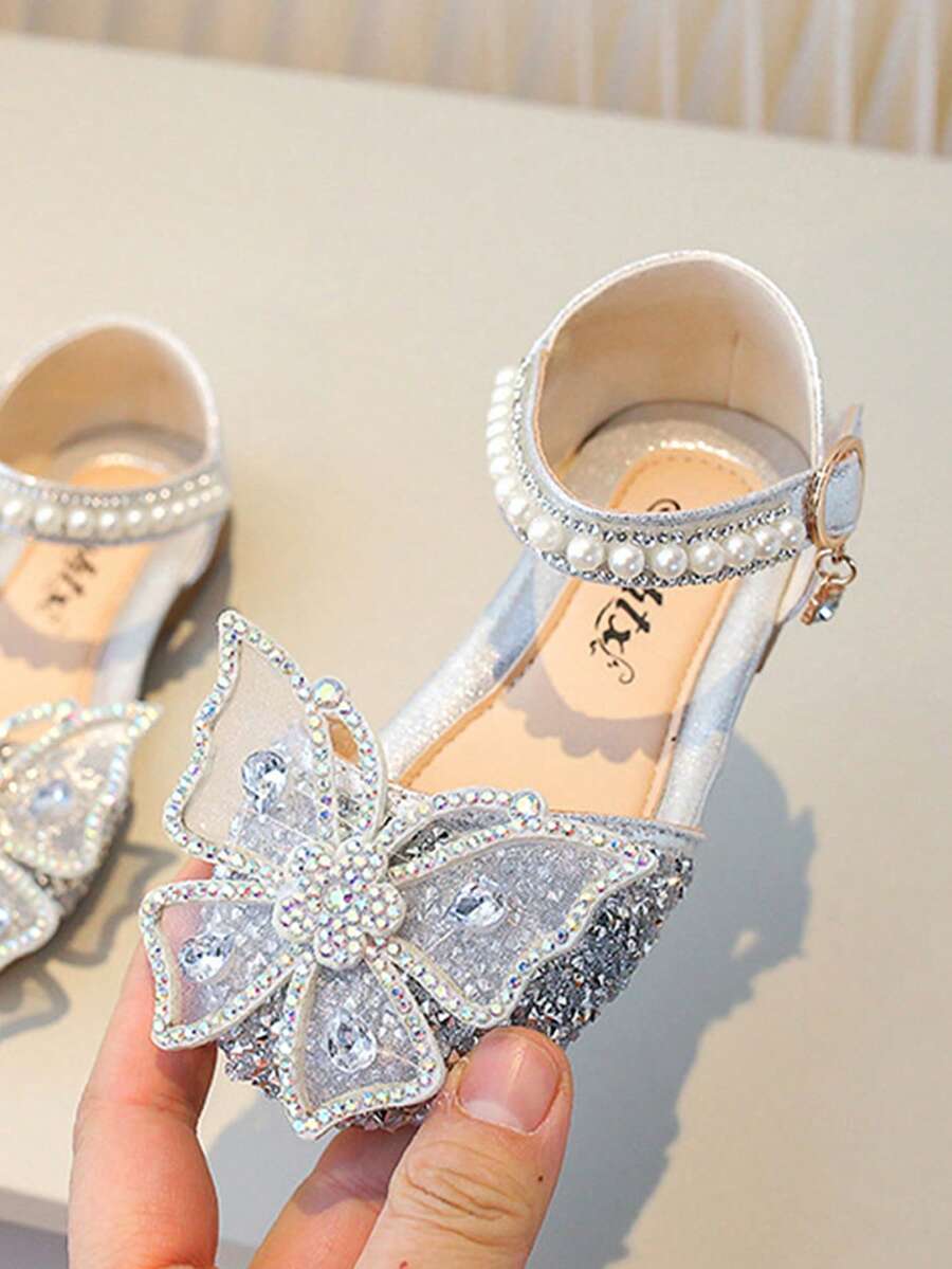 Sandalias de mariposa elegantes y a la moda para niñas, decoradas con flores, perlas y diamantes brillantes, suaves y cómodas, antideslizantes y resistentes al desgaste, adecuadas para fiestas, eventos y para llevar a diario.