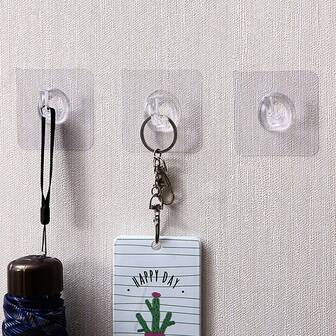 20 st. väggkrokmärken, starka självhäftande krokar, spårlösa krokar, väggmonterade förvaringsställsmärken, ingen borrning krävs för installation, klistermärken för badrumskrok, lämpliga för badrum, kök, bakom dörrar och kontor.