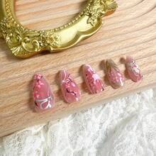 30Pcs Pink Flower Press On Nails Medium Almond Nails With 3D Pearl Rhinestones Designs Glue On Nails Peach Blossom Acrylic Nails Cute False Nails Bow Stick On Nails Women Nail Supplies - 1 - 查看 6