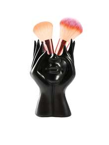 骷髅头化妆刷架兼笔筒，适用于梳妆台、书桌、办公室收纳，也可作为万圣节糖果碗或哥特式装饰品。