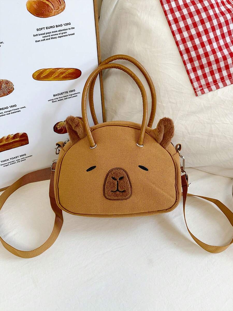 新款时尚水豚贝壳包，卡皮巴拉立体手提包，可爱女生斜挎包，适合初中高中大学生书包。