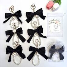 18/3件/套 优雅黑色蝴蝶结钥匙扣套装，适用于手机、包包、钥匙、汽车、耳机挂件，是分发节日派对用品、赠送亲朋好友、婚礼祝福、生日和其他重要节日的完美之选。 - 黑色蝴蝶結 - 查看 3