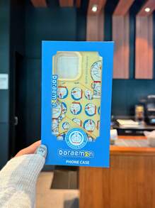 Doraemon Funda de teléfono con licencia oficial compatible con Apple iPhone 16 Pro Max, 15 Pro Max, 15, con patrón de Doraemon, cubierta protectora de Body completo, anti caídas, impresión de alta definición, antideslizante para iPhone 11, 12, 13, 14, 15, 16 Plus, 15 Plus, 14 Plus