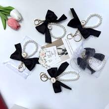 18/3件/套 优雅黑色蝴蝶结钥匙扣套装，适用于手机、包包、钥匙、汽车、耳机挂件，是分发节日派对用品、赠送亲朋好友、婚礼祝福、生日和其他重要节日的完美之选。 - 黑色蝴蝶結 - 查看 5