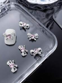 25/50/10 Stück Legierungs-Silber Schmetterling Biene Herz Schleife Nagel Dekoration mit glitzernden rosa Strass-Sternflügeln und geometrischem Muster, 3D exquisite DIY Nagelschmucksteine für Acryl-Nägel, Handyhüllen, Schuhe, Kleidung, Taschen und Bastelarbeiten - Verschiedenfarbig - Übersicht 30