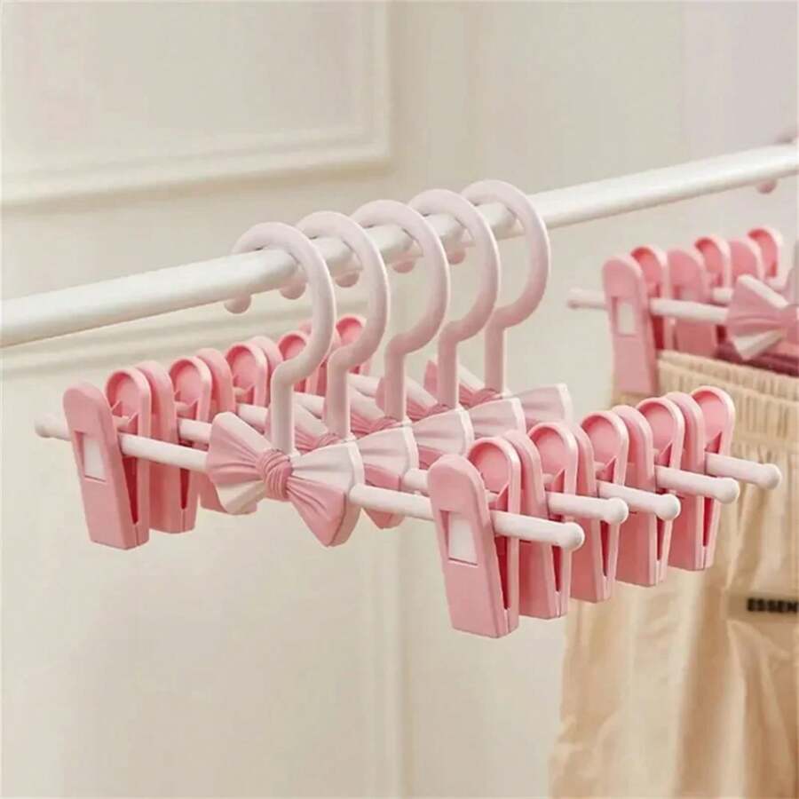 5/10 piezas de colgador de faldas con agarre de plástico ajustable, estante para pantalones, ahorrador de espacio, estante de secado de ropa interior, organizador de almacenamiento - 5 piezas rosa C3110A5PCS - Ver 1