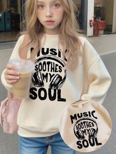 1 女童长袖圆领套头衫，印有“MUSIC SOOTHES MY SOUL”文字图案，为年轻女孩/青少年女孩提供舒适、时尚、休闲的全新秋冬季上衣