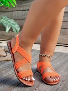 2024 女士交叉带沙滩凉鞋，透气面料平底，夏季度假必备