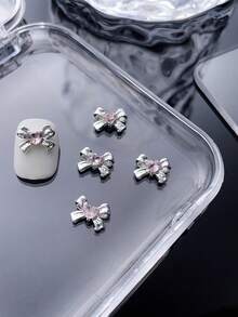25/50/10 Stück Legierungs-Silber Schmetterling Biene Herz Schleife Nagel Dekoration mit glitzernden rosa Strass-Sternflügeln und geometrischem Muster, 3D exquisite DIY Nagelschmucksteine für Acryl-Nägel, Handyhüllen, Schuhe, Kleidung, Taschen und Bastelarbeiten - Verschiedenfarbig - Übersicht 27
