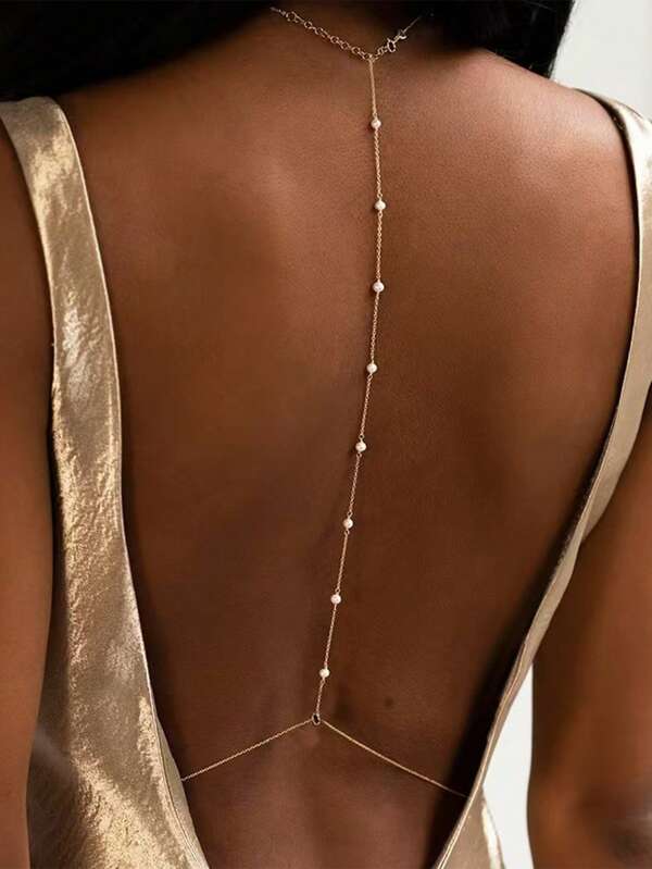 1pc Golden Stainless Steel Chain Body Chain Paired With A White Round Pearl-Like Back Chain Exudes A Feminine Elegance And Fashion, Making It Suitable For Wedding, Engagement And Dance Parties. (The Number Of Beads Is Random And Not Fixed.