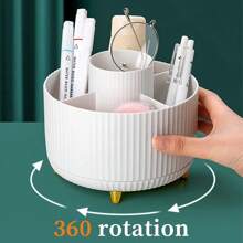 办公桌面笔筒，容量大，拥有5格收纳格，并配有360°旋转塑料笔筒。它是一款多功能桌面收纳盒，可收纳化妆刷、化妆品收纳盒、浴室梳妆台，以及日常居家、卧室、浴室、书房、办公室、学校宿舍等各种办公用品的收纳整理。是开学季桌面装饰的理想之选。 - 彩色 - 查看 3