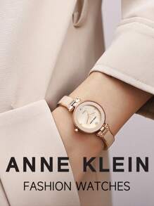 Anne Klein ساعة سوار ذهبية وردية اللون بحجر كوارتز للنساء، ساعة فاخرة مرصعة بالماس مع قرص من صدف اللؤلؤ الوردي الفاتح، ساعة أنيقة للاستخدام اليومي، هدية ساعة أنيقة للسيدات، AK/1980BMRG