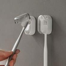 Soporte para cepillo de dientes para uso doméstico, perchero para cepillo de dientes minimalista montado en la pared sin taladrar, con tapa de cierre automático, estante de almacenamiento para cepillo de dientes, organizador portátil y simple para el baño, organizador de cepillo de dientes a prueba de polvo con tapa