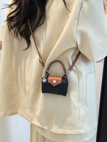 新款冬季迷你时尚手提包，采用撞色设计，防水尼龙材质，可作单肩包、方形包和蔬菜篮包使用，适合通勤、聚会和度假。 - 黑色 - 查看 5