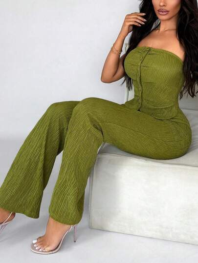 Conjunto de top elegante y pantalón largo, look minimalista de oficina, con top satinado y sexy para fiestas. Conjunto de mujer con pantalón verde ajustado con cremallera, sin mangas, acampanado.