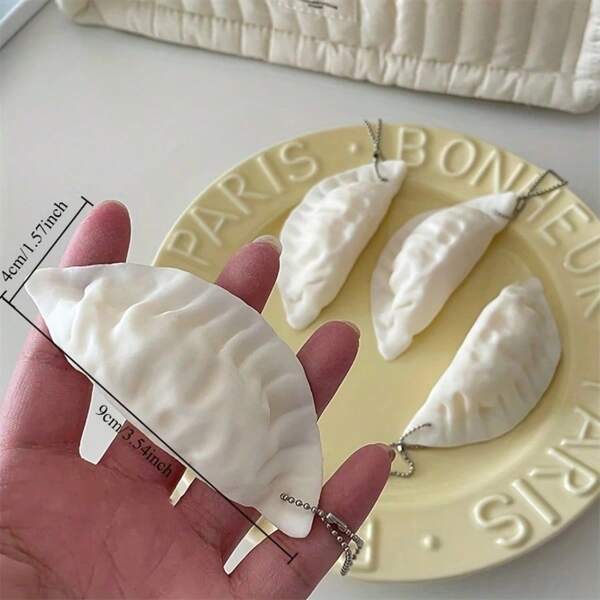 Schattige mini-dumpling sleutelhanger, ontworpen om voedseldecoratie na te bootsen, perfect als cadeau voor stressverlichting