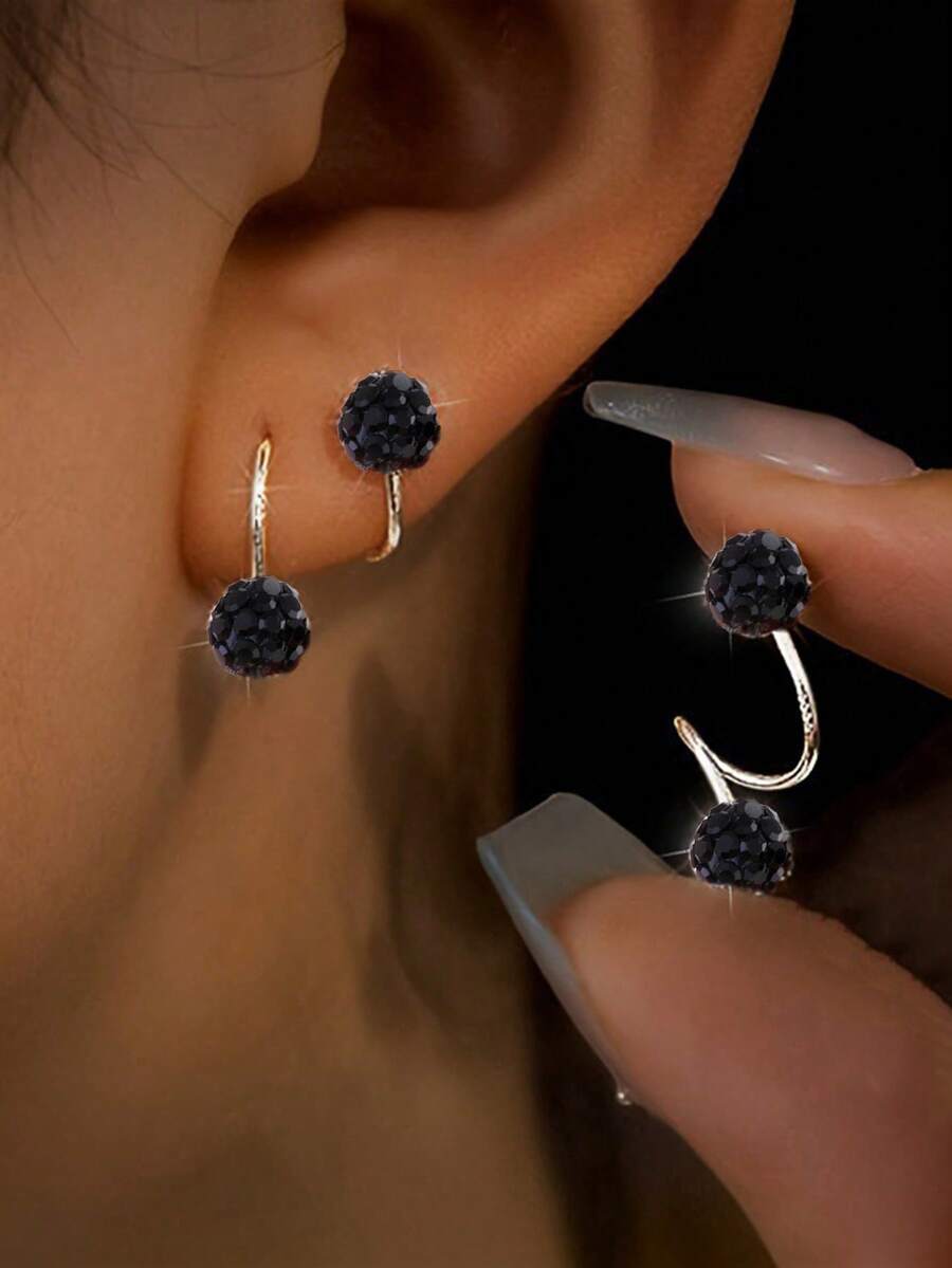 1 par de pendientes de lujo con doble cabeza de tornillo con rhinestones, diseño único de perforación en forma de S