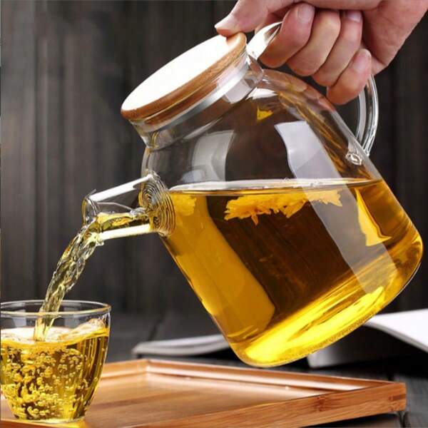 Een theepot van borosilicaatglas met infuser - Herbruikbaar, magnetronbestendig - Veelzijdig, rond, geschikt voor vruchtenthee, sap en dranken - Hittebestendig - Perfect voor Kerstmis, Halloween, Pasen, Thanksgiving - Geen patronen, alleen met de hand afwassen