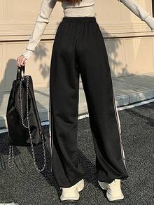 Pantalones deportivos casuales con diseño de estrella patchwork y rayas laterales estilo - Blanco y Negro - Ver 4