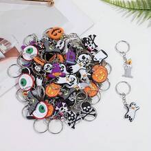 1 set da 15 pezzi, ciondoli e portachiavi casuali per Ognissanti con motivi di cartoni animati, accessori per borse da donna, ciondoli asimmetrici per Ognissanti