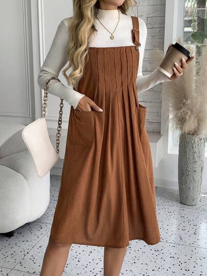 Vestido informal de peto de pana con hebilla de metal para uso diario, vestido tipo línea A con pliegue en el pecho y bolsillo, longitud hasta la rodilla, unicolor, conservador, elegante y casual con volante en el dobladillo y botones