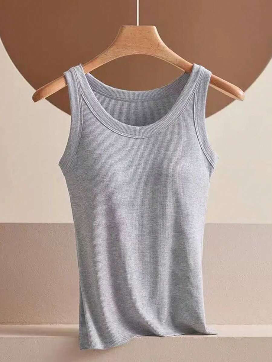 Comoda canotta minimalista, aderente e sexy con imbottitura sul busto, canotta intima da donna