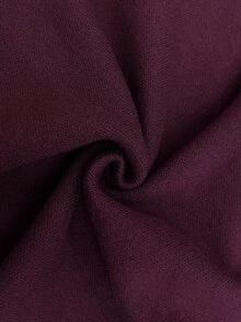 朴素时尚的金属纽扣 V 领长袖不对称下摆开衫，优雅简约的基本款商务休闲圣诞上衣，适合秋冬季女士穿着