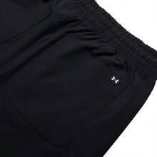 Under Armour Pantalones jogger tejidos Icon, pantalones de entrenamiento de ajuste holgado con cordón en la cintura, 6000663 - Negro - Ver 5