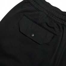 Under Armour APAC M Elevated Flc Jogger Pants, Knit Relaxed Fit Casual Pants For Daily Wear & Running, 1387977-001 - Black - View 7
