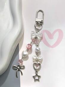 1条创意珍珠蝴蝶结粉色手机挂绳/相机背带。注意：由于拍摄角度和放大倍数不同，实际尺寸可能与照片略有差异。