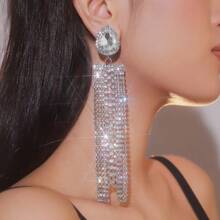 1 par de brincos pendentes de cristal em forma de lágrima exagerada e elegante