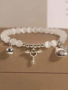 5 piezas, pulsera con encanto de  oficialmente autorizada por  - Estilo Y2K E y accesorio Kawaii elástico, que incluye colgante con forma de corazón, alas de ángel y llave, cristal sintético de piedra natal de agosto, lindo regalo de dibujos animados, uso diario del Día de San Valentín para niña, colgante de pulsera de , joyería diaria, accesorios para fiestas, diseño divertido, decoración de cuentas, regalo para cumpleaños, pendiente con diseño de perlas, accesorio para niñas - Multicolor - Ver 16