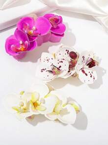 1个兰花发夹，3种颜色可选（腮红粉、紫色、深红色） - 采用层叠逼真的花瓣和黑色弹簧夹，适合打造海滩造型或作为优雅的日常发饰。 - 彩色 - 查看 2