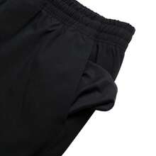 Under Armour Pantalones jogger tejidos Icon, pantalones de entrenamiento de ajuste holgado con cordón en la cintura, 6000663 - Negro - Ver 3