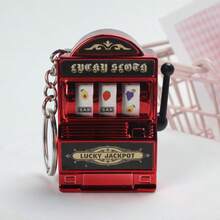 1 Stück 2025 Neue Obst-Schlitzmaschine Schlüsselanhänger, elektrolytisch beschichtet, Retro Spielmaschine Mini Spielzeug Stressabbau Tasche Anhänger, Geburtstags-/Weihnachten/Halloween Geschenk