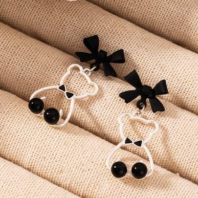 1 đôi bông tai hình gấu dễ thương có nơ, ngọt ngào và dịu dàng, thích hợp để đeo hàng ngày, quà tặng cho mẹ, bạn bè.