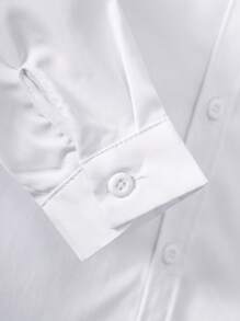 Camisa formal blanca con estilo clásico universitario para niño joven con estampado floral en el bolsillo, parches de tela empalmados y manga larga para ocasiones casuales o de fiesta
