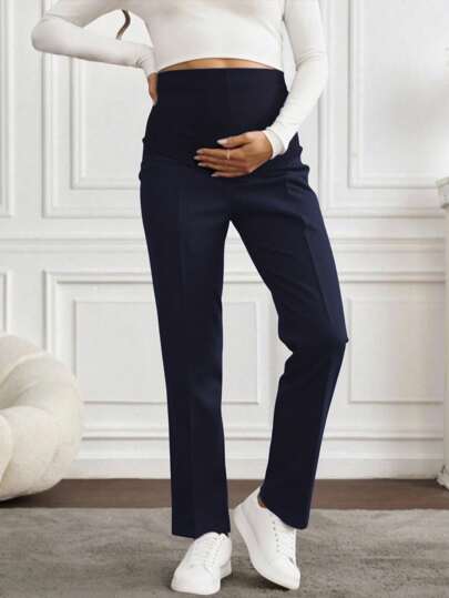 Pantalón maternidad, pantalón vestir premamá, ropa embarazada elegante, pretina elástica, soporte vientre, pantalón formal embarazo, moda gestante, comfort premamá, pantalón trabajo maternidad, prendas maternidad.