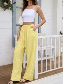 Pantalon jaune rayé à taille élastique, design polyvalent, sens de la mode européen et américain. Nouvelle arrivée printemps/été pour femmes DEEKA