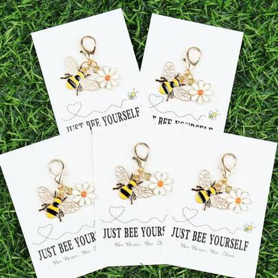 5个/10个迷你蜜蜂雏菊钥匙扣，内含“做你自己”励志卡片，励志卡片礼品，耐用合金材质，是生日、友谊、自我成长、婚礼、圣诞节、包包挂饰的理想之选，男女皆宜。也是送给老师、姐姐或爱人的礼物创意。