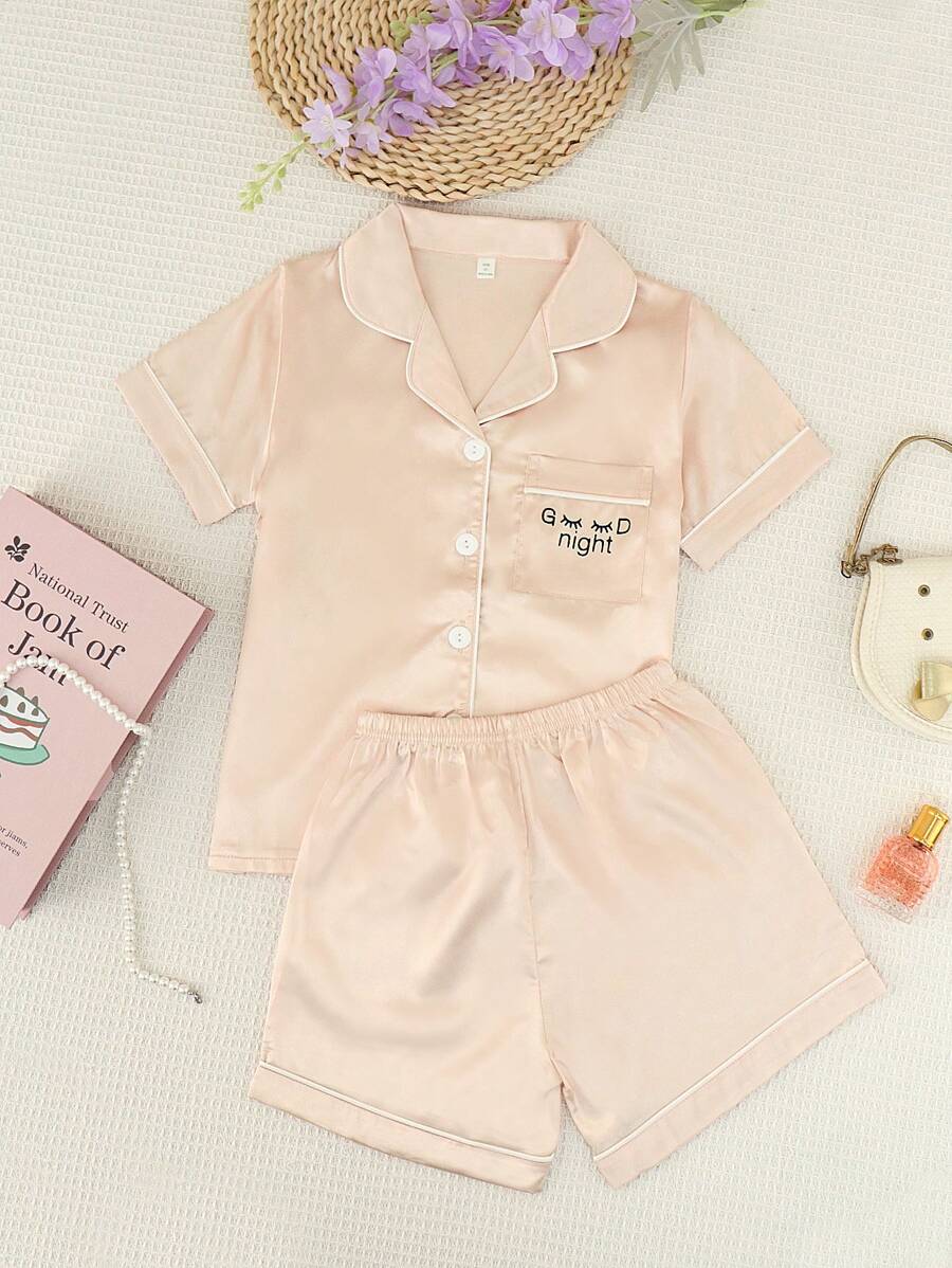 Conjunto de pijama de 2 piezas para niñas con polo, mangas cortas y pantalones cortos. unicolor y eslogan "Buenas noches", cómodo y casual para estar en casa