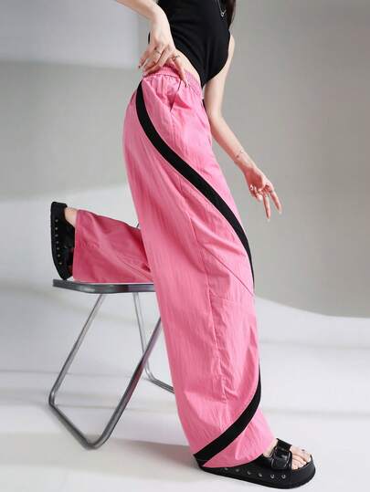 Pantalones deportivos casuales anchos y sueltos con diseño de rayas y empalmes curvos para mujer