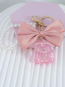 三件套：闪亮粉色洋葱亮片、26个树脂大写英文字母、18K镀金龙虾扣扁环链，搭配时尚粉色布艺蝴蝶结和仿珍珠串珠装饰配件，适用于包包链、手机挂绳、钥匙扣，也可作为礼物送给朋友、母亲、车饰、包包挂饰、背包挂件、带证件夹的挂绳、汽车装饰、圣诞汽车饰品、老师、姐妹等。 - 粉色 - 查看 22