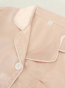 Conjunto de pijama de 2 piezas para niñas con polo, mangas cortas y pantalones cortos. unicolor y eslogan "Buenas noches", cómodo y casual para estar en casa