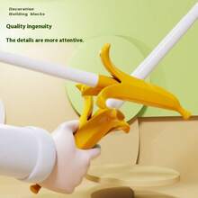 1pc Retractable Banana Sword - Gravity Sensing Design, Portable Mini Version, Elastic Samurai Sword Shape, Finger Pressure Relief Tool, Party Gag Gift, Birthday Fun Surprise, Holiday Humor Gift, Christmas Funny Favor, New Year Entertainment Item, Adult Novelty Toy, Desktop Dynamic Decoration