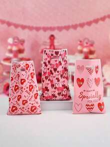 100 piezas Bolsa de regalo del Día de San Valentín de plástico impermeable con patrón de corazones rojos y rosas, adecuada para regalos pequeños, dulces, fiestas, bodas y decoraciones de cumpleaños (estilo aleatorio)