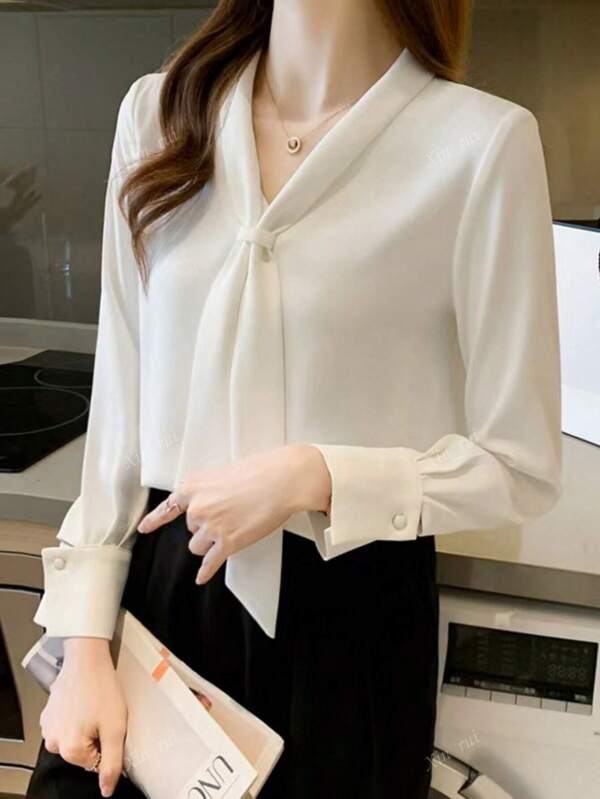 Camisa de manga larga de unicolor, elegante y minimalista para la oficina y el transporte de mujeres